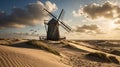 Old Windmill Structure on a Sand Dune Landscape with a Cloudy Dramatic Sky View Royalty Free Stock Photo