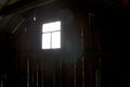 Rustic window with empty white space behind on wooden wall. Old Abandoned Attic wall as template for placing window background