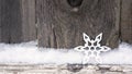 Rustic winter Christmas background with snowflake on wooden texture. Christmas and New Year greeting card background Royalty Free Stock Photo