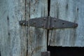 Rustic wood barn details rusty hinges