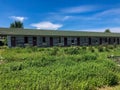 Rustic wood building with colored doors Royalty Free Stock Photo