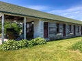 Rustic wood building with colored doors Royalty Free Stock Photo