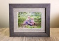 Rustic Wood Framed Portrait of a Family of Three Children Outside