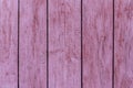 Rustic wood texture or background with scratched pink paint Royalty Free Stock Photo