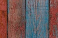 Rustic wood texture or background with scratched red and blue paint Royalty Free Stock Photo