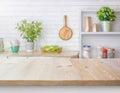 Rustic Wood Texture Table Against Blurry Kitchen Wall and Shelf Background Royalty Free Stock Photo