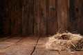 Rustic wooden background with hay bale Royalty Free Stock Photo