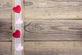 Rustic wooden background with sacking border and hearts. Copy sp Royalty Free Stock Photo