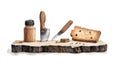 A rustic wooden board with kitchen tools a knife and crisp bread Perfect for culinary or cookingthemed projects Royalty Free Stock Photo