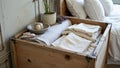 Rustic wooden chest with folded linens and lavender arrangement Royalty Free Stock Photo