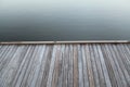 A rustic wooden deck on Rianhard Lake in Celebration Royalty Free Stock Photo
