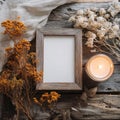 Rustic Wooden Frame Mockup with Autumn Decor and Warm Candlelight Royalty Free Stock Photo