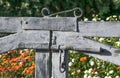 Rustic wooden gate to the courtyard with blooming garden. Summer day floral background Royalty Free Stock Photo