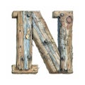 Rustic wooden letter N made of old weathered barn wood with knots and nail holes.