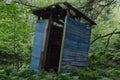 Rustic Wooden Outhouse