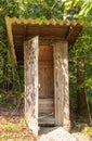 Rustic Wooden Outhouse in Forest Royalty Free Stock Photo