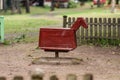rustic wooden playground rocking horse in a park setting.. Royalty Free Stock Photo