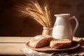 Rustic wooden shelf holds a ceramic plate with bread, beside a milk jug. A vase showcases ripe wheat. Cozy ambiance Royalty Free Stock Photo