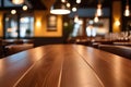 Rustic Wooden Table in Cozy Restaurant with Warm Atmosphere and Blurred Background Royalty Free Stock Photo