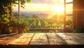 Rustic Wooden Table with Vineyard Sunset View Royalty Free Stock Photo