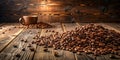 Rustic wooden table setting featuring a pile of aromatic roasted coffee beans beside a simple earthenware mug, perfect for a Royalty Free Stock Photo