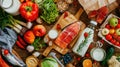 a rustic wooden table, showcasing a colorful arrangement of meat, fish, vegetables, fruits, and milk from an aerial