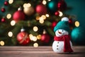 A Rustic Wooden Table With Snowman And A Pine Tree In The Blur Background Royalty Free Stock Photo