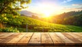 Rustic Wooden Table with Vineyard Sunset Backdrop Royalty Free Stock Photo