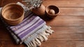 Rustic wooden table with woven basket, textured fabrics, and ceramic vase decor Royalty Free Stock Photo