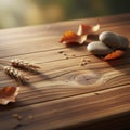 Rustic Wooden Tabletop with Wheat Stones and Autumn Leaves Royalty Free Stock Photo