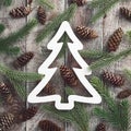 Rustic wooden texture with fir tree shaped paper frame Royalty Free Stock Photo