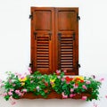 Rustic wooden window with floral decoration, on white b Royalty Free Stock Photo