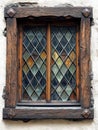Rustic Wooden Window with Leaded Glass and Diamond Patterned Panes Royalty Free Stock Photo