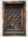 Rustic Wooden Window with Leaded Glass and Diamond Patterned Panes Royalty Free Stock Photo