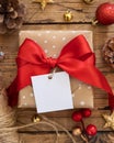 Christmas Gift Box with square blank gift tag top view Royalty Free Stock Photo