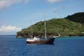 A rusting boat anchored at port elizabeth in the caribbean Royalty Free Stock Photo