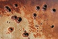 Rusting bullet holes background Royalty Free Stock Photo