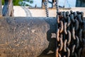 Rusting metal chains on iron spool Royalty Free Stock Photo