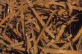 Rusting metal bands sitting in a pile