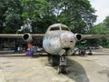A rusting old jet plane in a car park in Yangon, Myanmar Royalty Free Stock Photo