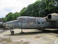 A rusting plane in a car park in Yangon, Myanmar Royalty Free Stock Photo