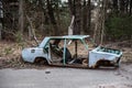 Rusty and abandoned car in Chernobyl Exclusion Zone