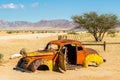 Rusty abandoned car wreck in desert, Solitaire, Namibia, Africa Royalty Free Stock Photo