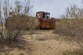 Rusty abandoned ship at the Ship cemetery at the former Aral sea coast in Moynaq Mo ynoq or Muynak , Uzbekist Royalty Free Stock Photo