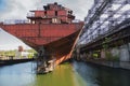 Rusty, abandoned ship under construction, unfinished ship at the factory Royalty Free Stock Photo