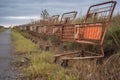 rusty abandoned shopping carts in a row