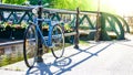 Rusty abandoned vintage retro bike parked by a bridge Royalty Free Stock Photo