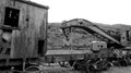 Rusty and abandoned waggon out of the railroad. The rotten waggon is located at a tropical forest [Black and White colors] Royalty Free Stock Photo