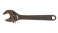 Rusty adjustable wrench on white background Royalty Free Stock Photo