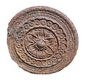 Rusty aged round sun symbol from iron isolated